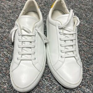 White common project sneakers.